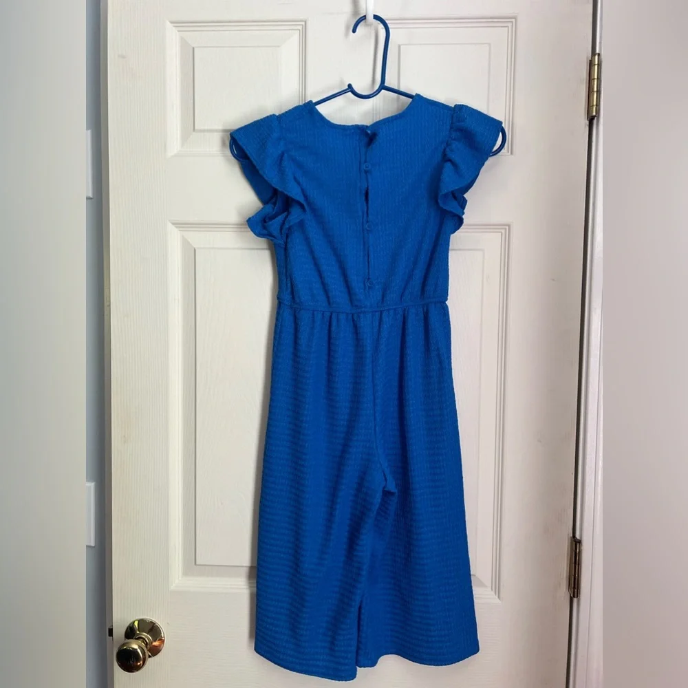 Primark royal blue textured jumpsuit with round neck and flutter sleeves